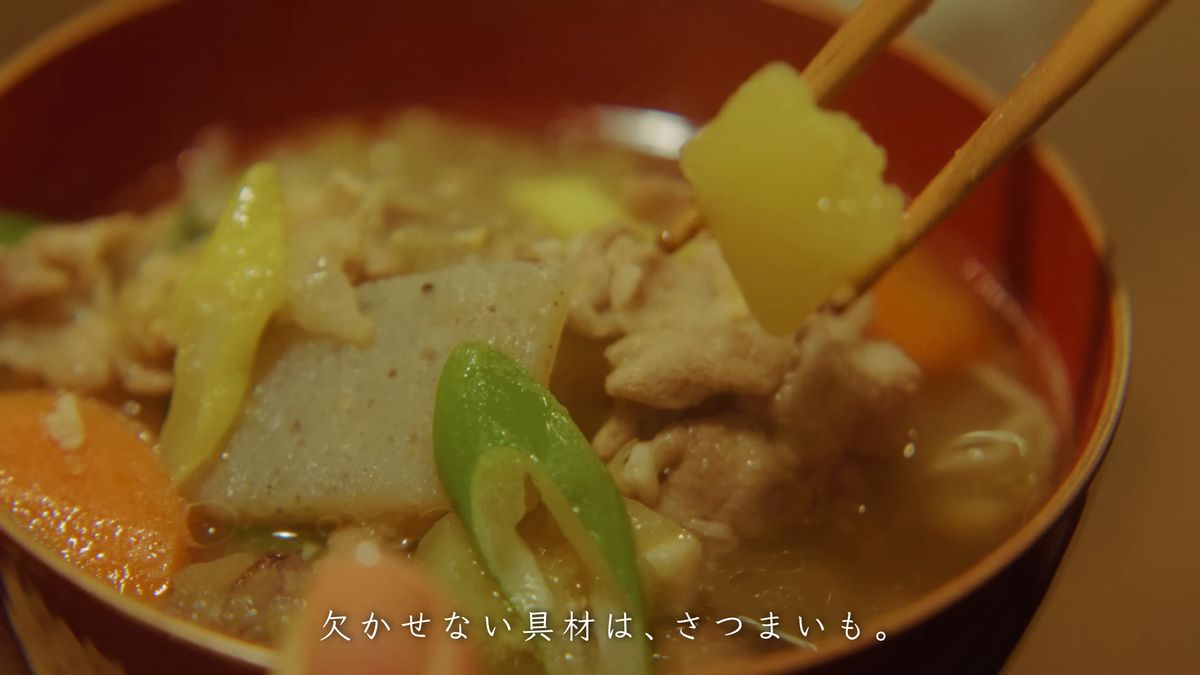 箸でつまんださつまいも