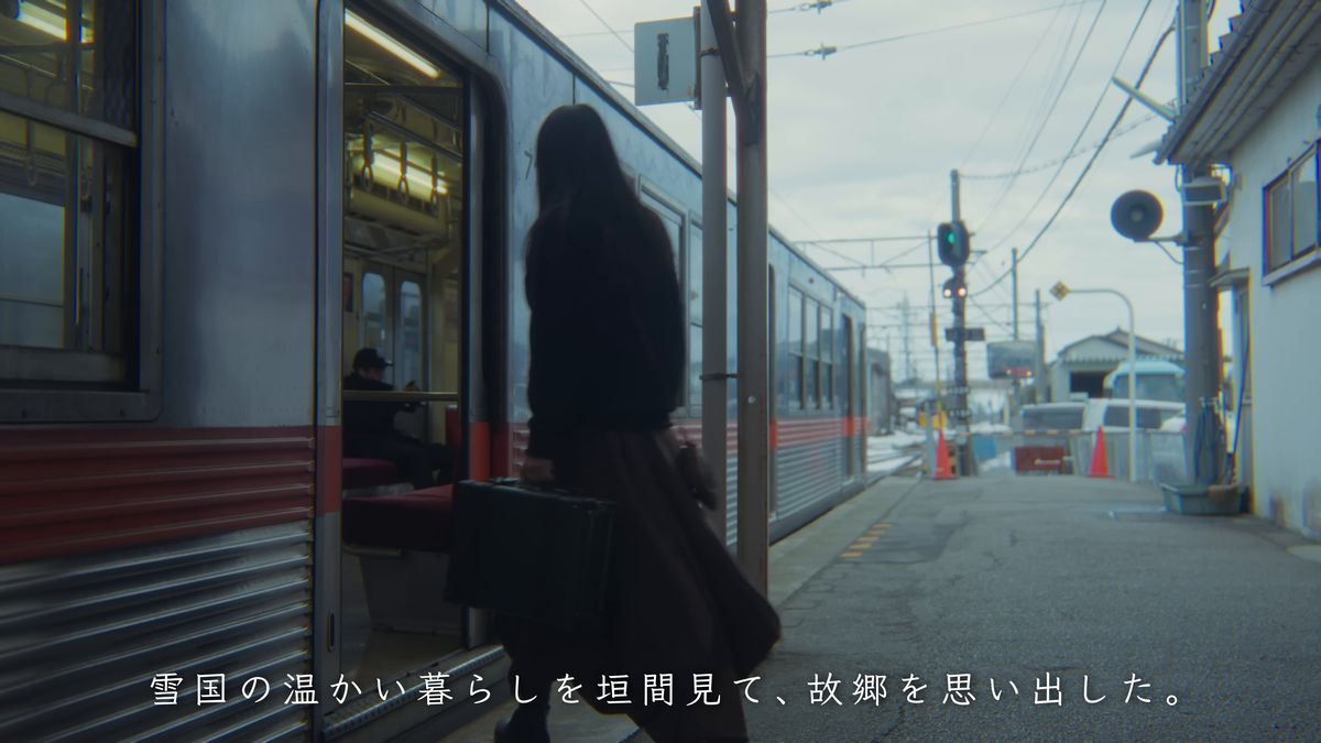電車に乗り込む後ろ姿