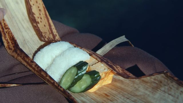 Rice-ball bento in bamboo sheath