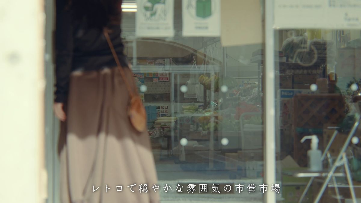 Peering into a shop through the glass door