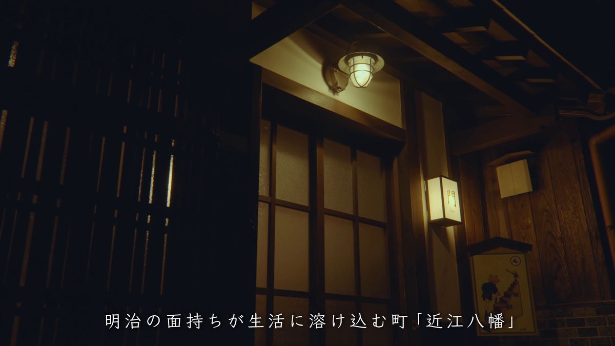 夜の宿の門にともる行灯